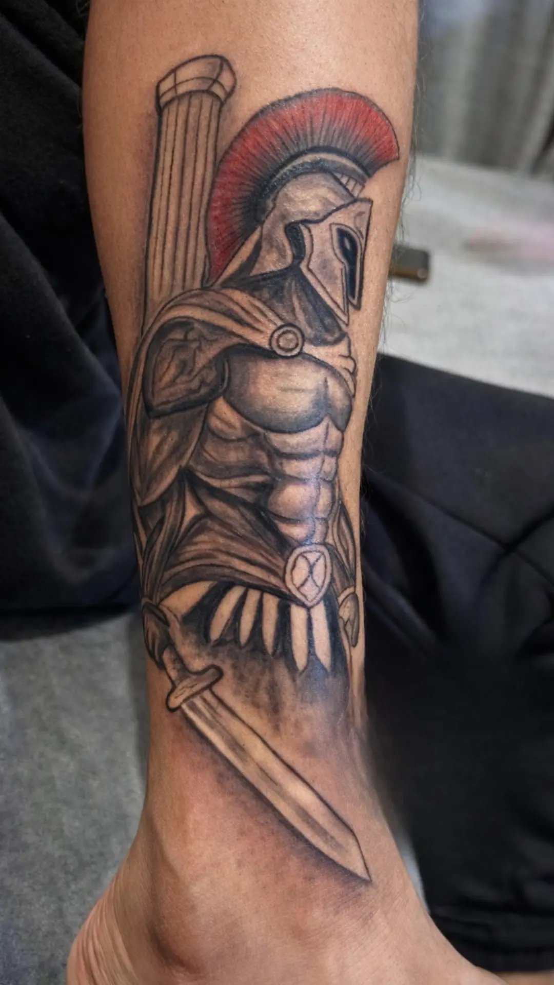 Spartan warrior realism tattoo on calf